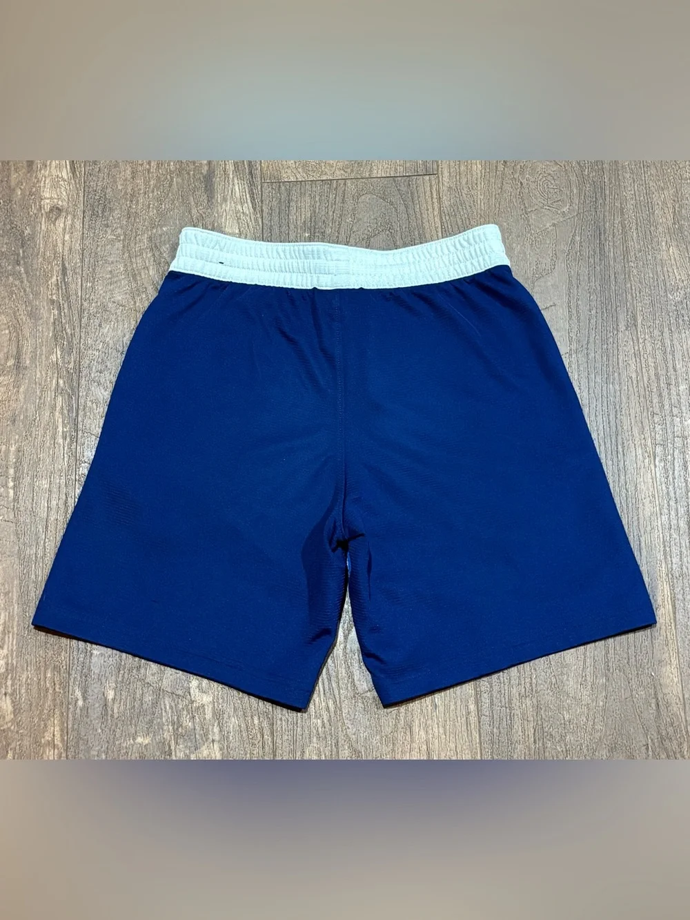 Nike Royal Blue Kids Athletic Shorts with Light Blue Swoosh and White Waistband